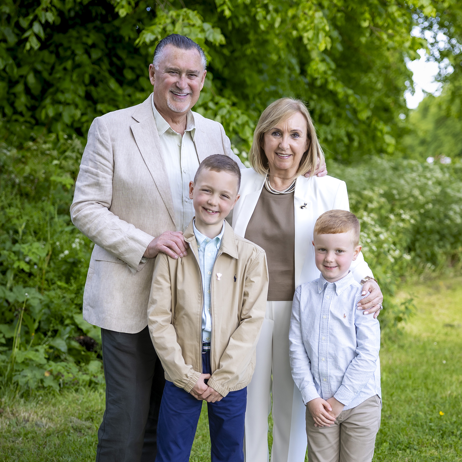 Grandparents and grandchildren on-location portrait in the garden by Jill O'Meara