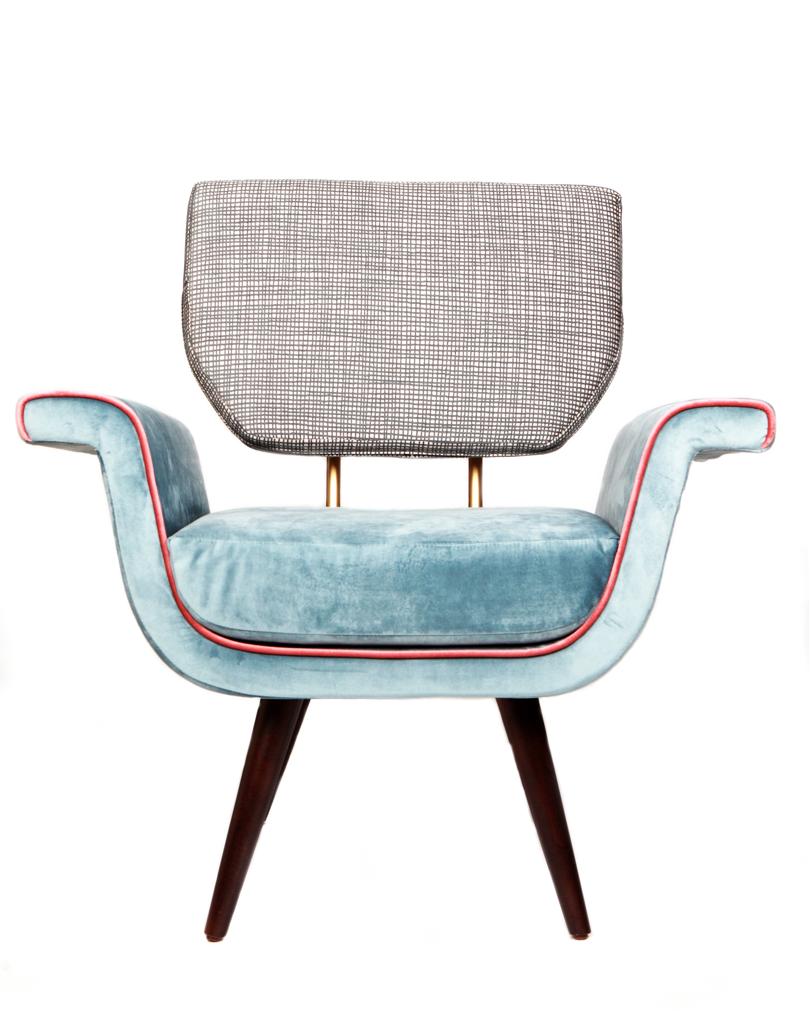 Blue upholstered armchair with pink piping product photography